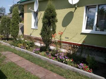 Фото номера Двухместный номер с 2 отдельными кроватями Гостевой дом Tsarikova House г. Loyew 21